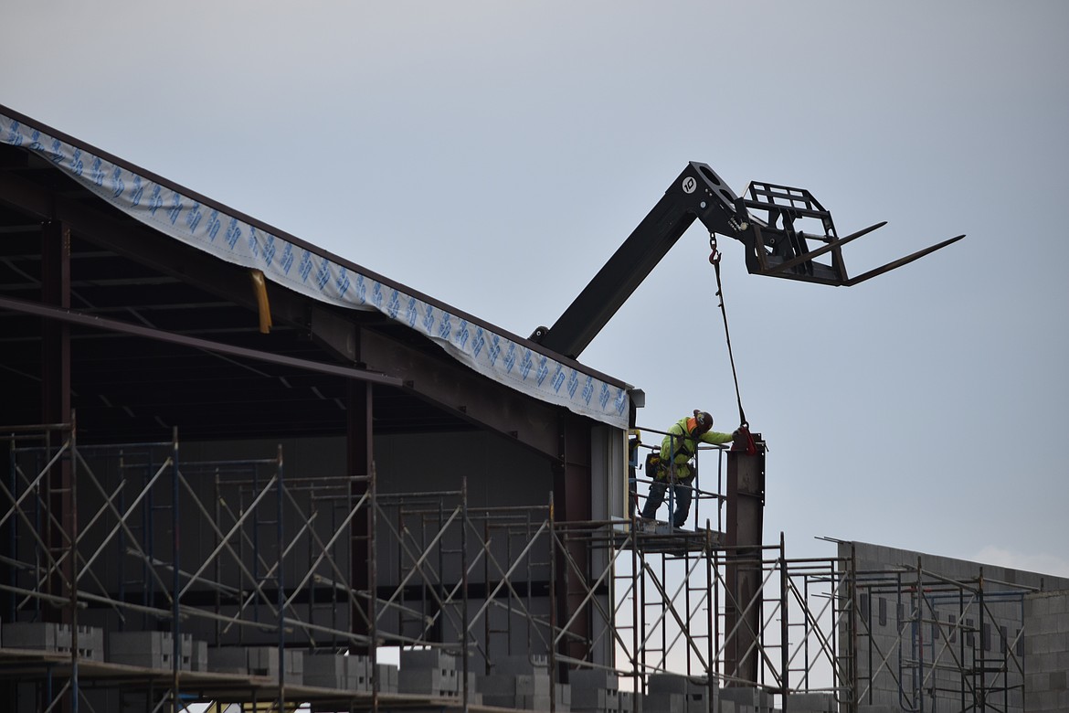 Crews install a steel support for one of the two jail annexes at the new Grant County Criminal Justice Center. Completion of the facility is anticipated in 2026.