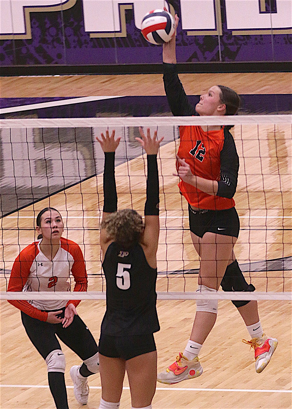 Ronan's Sierra Blood slams the ball over the net during last Thursday's Ronan-Polson match. (Bob Gunderson photo)