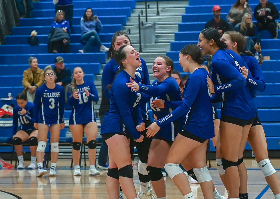 The Lady Bulldogs celebrate a win over Superior Oct. 29, which earned them  a slot in the Western 7B District tournament, held last week in Thompson Falls. (Christa Umphrey photo)