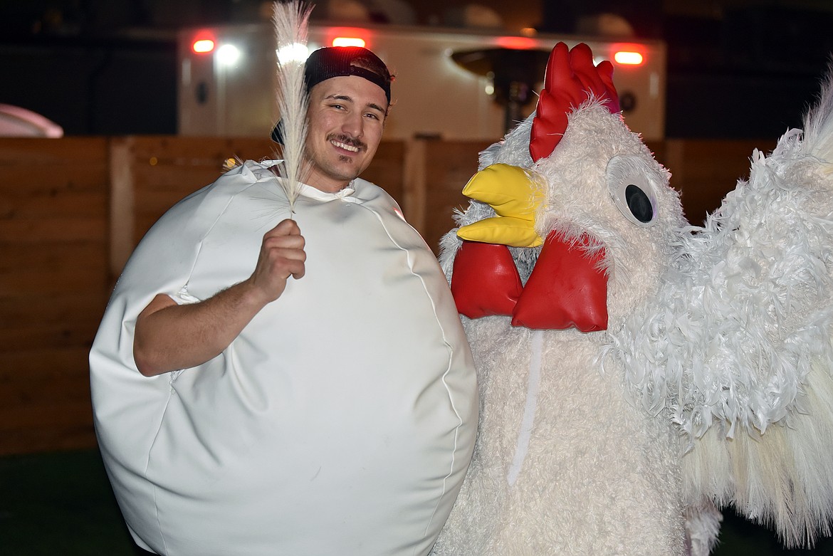 Egg Blaine Carr and chicken Annie Nixon on Halloween in Whitefish. (Kelsey Evans/Whitefish Pilot)