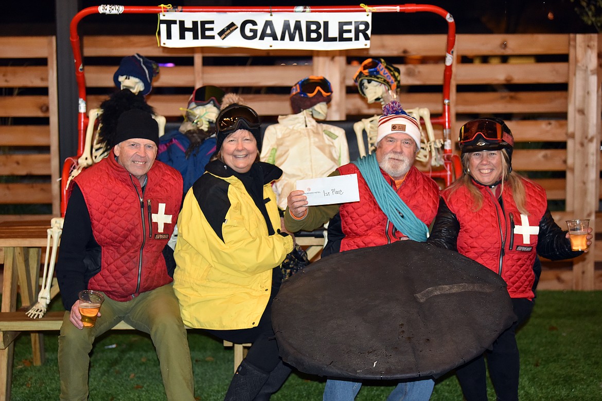 The Gambler rescue team comes to save long-dead skeletons off a broken chairlift, winning first place in Whitefish's Halloween costume contest. (Kelsey Evans/Whitefish Pilot)