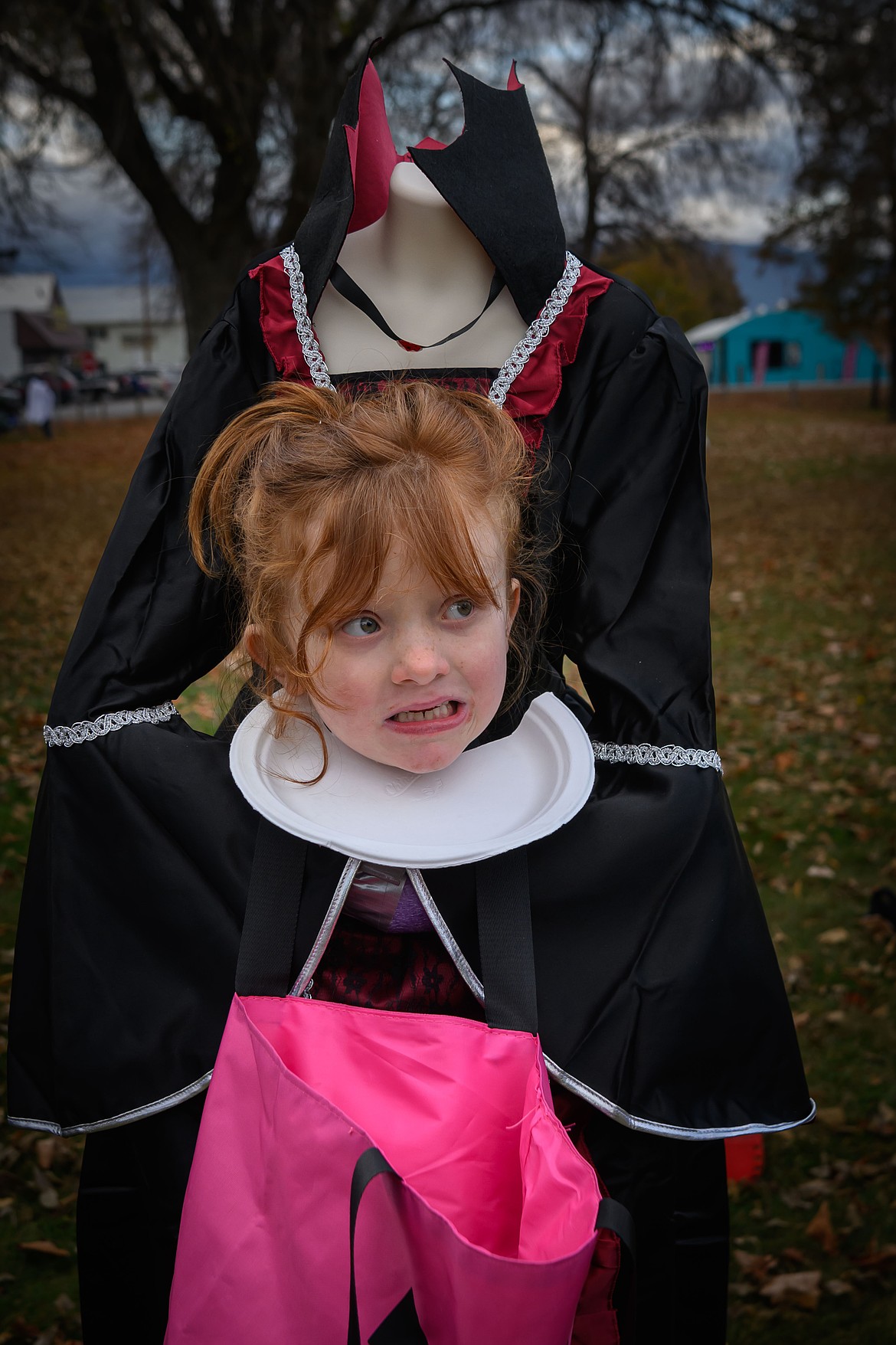 Emma Lynn 7 in a headless queen of hearts costume. (Tracy Scott/Valley Press)