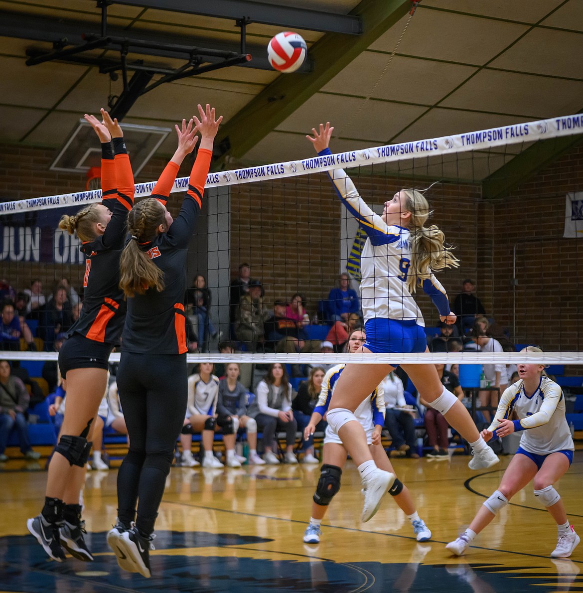 Plains Trotters Claire Lakko (left) and Aubree Butcher attempt to block a shot by Thompson Falls' Gabi Hannum (white jersey) during their 7B semifinal match in T Falls this past weekend.  The Lady Hawks won the district tournament over Eureka.  (Photo by Tracy Scott)