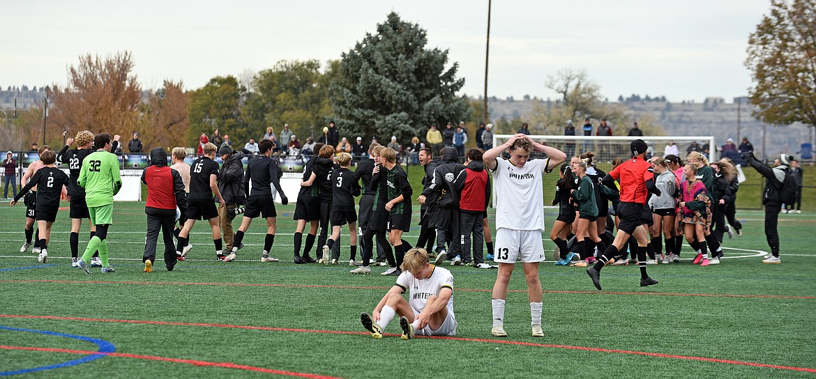 The Billings Central boys soccer team celebrates their win at the Montana Class A Championship on Saturday. (Julie Engler/Whitefish Pilot)