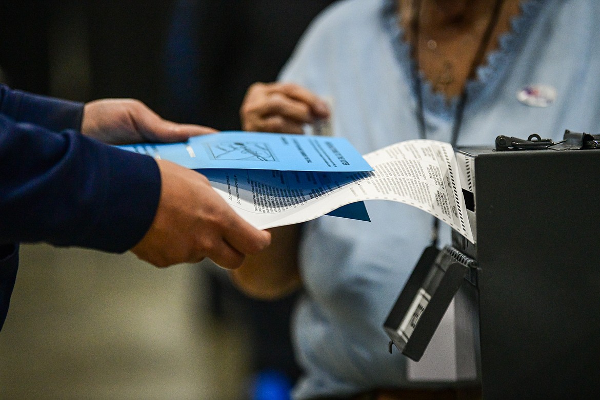 A voter casts a ballot inside the Trade Center at the Flathead County Fairgrounds on Tuesday, Nov. 5. (Casey Kreider/Daily Inter Lake)