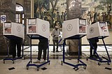 Election Day voting unfolds generally smoothly with some scattered issues and delays
