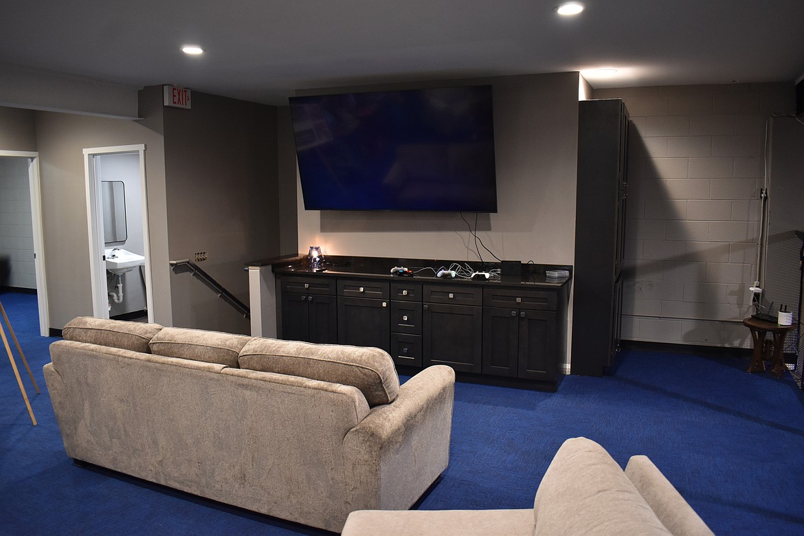 The gaming area in the remodeled loft at Youth Dynamics boasts a big-screen TV where six or seven players can compete.