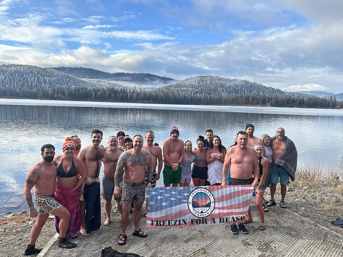 Luke Opp, center left, founder of The Frozen Chosen, with fellow cold-plungers.