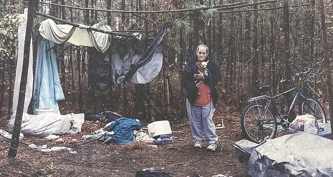 In 2014, Hallie Sprague, 46, prepares to leave her home in the woods behind Target.