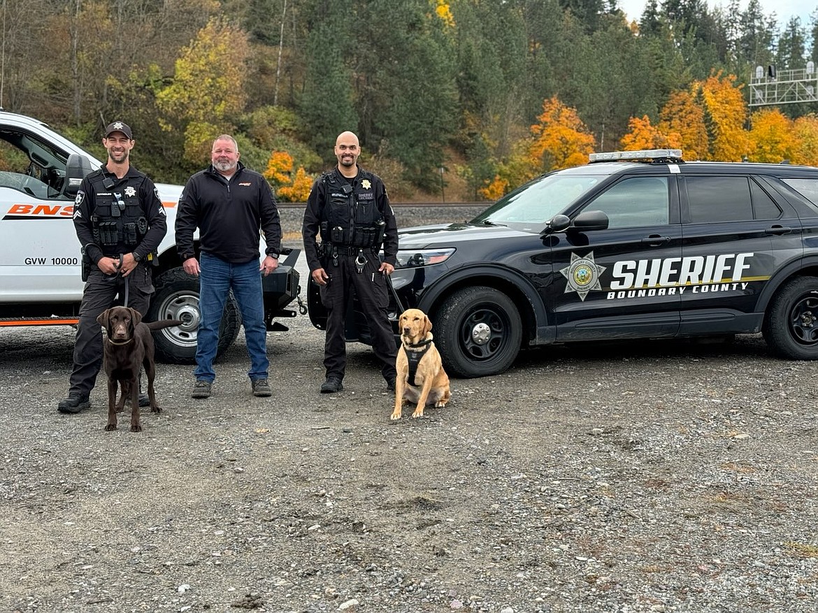 Pictured, from left, are Boundary County Sheriff's Cpl. Greg Reynolds with his new K9 partner Mika; Vic Ahlf, general foreman for BNSF Spokane Subdivision; and BCSO Sgt. Mike Valenzuela and his K-9 partner Buddy.