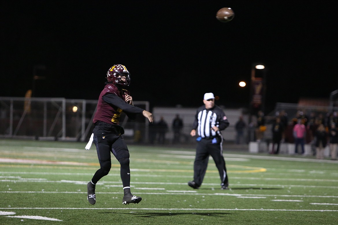 Moses Lake junior Brady Jay throws on the run during an Oct. 18 game against Eastmont. Jay has thrown for nearly 3,000 yards this season, throwing 43 touchdowns to just one interception.