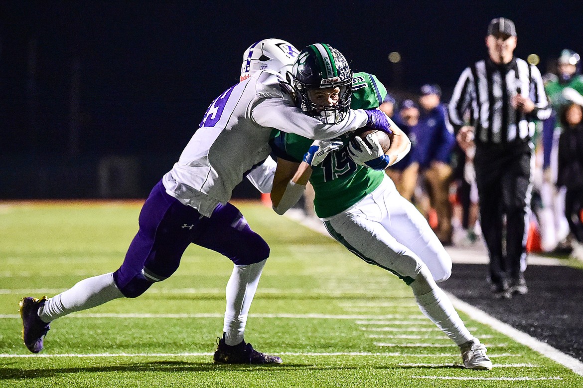 Glacier wide receiver Easton Kauffman (19) is stopped short of the goaline by Butte defensive back Torre Tempel (19) in the second quarter during a Class AA playoff game at Legends Stadium on Friday, Nov. 8. (Casey Kreider/Daily Inter Lake)