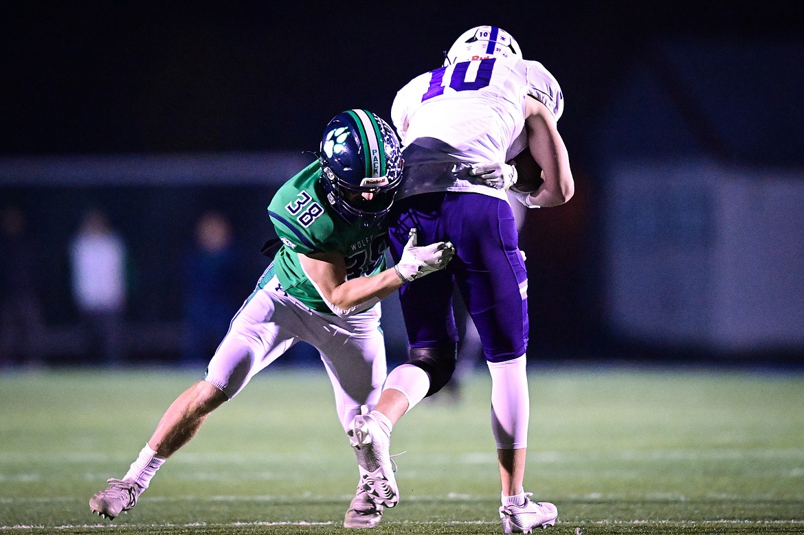 Glacier linebacker Carson Baker (38) tackles Butte wide receiver Karsen McEwen (10) in the first quarter of a Class AA playoff game at Legends Stadium on Friday, Nov. 8. (Casey Kreider/Daily Inter Lake)