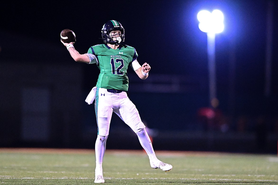 Glacier quarterback Jackson Presley (12) throws a 32-yard touchdown pass to wide receiver Cooper Pelc in the third quarter against Butte during a Class AA playoff game at Legends Stadium on Friday, Nov. 8. (Casey Kreider/Daily Inter Lake)