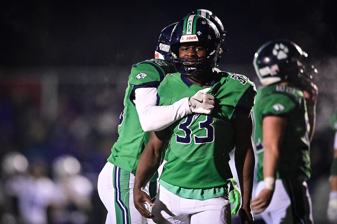 Glacier running back Kobe Dorcheus (33) celebrates with teammates after a 46-yard touchdown run in the fourth quarter against Butte during a Class AA playoff game at Legends Stadium on Friday, Nov. 8. (Casey Kreider/Daily Inter Lake)