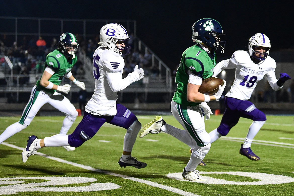 Glacier wide receiver Bridger Smith (1) runs during a 68-yard reception in the second quarter against Butte in a Class AA playoff game at Legends Stadium on Friday, Nov. 8. (Casey Kreider/Daily Inter Lake)