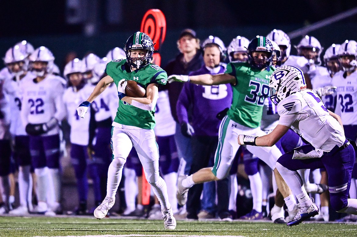 Glacier defensive back Easton Kauffman (19) returns an interception 55 yards for a touchdown in the first quarter against Butte during a Class AA playoff game at Legends Stadium on Friday, Nov. 8. (Casey Kreider/Daily Inter Lake)