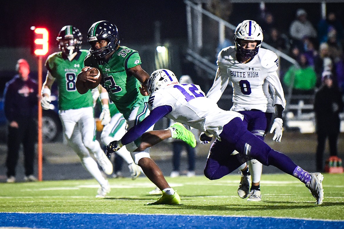 Glacier running back Kobe Dorcheus (33) scores a touchdown on an 11-yard run in the third quarter against Butte during a Class AA playoff game at Legends Stadium on Friday, Nov. 8. (Casey Kreider/Daily Inter Lake)