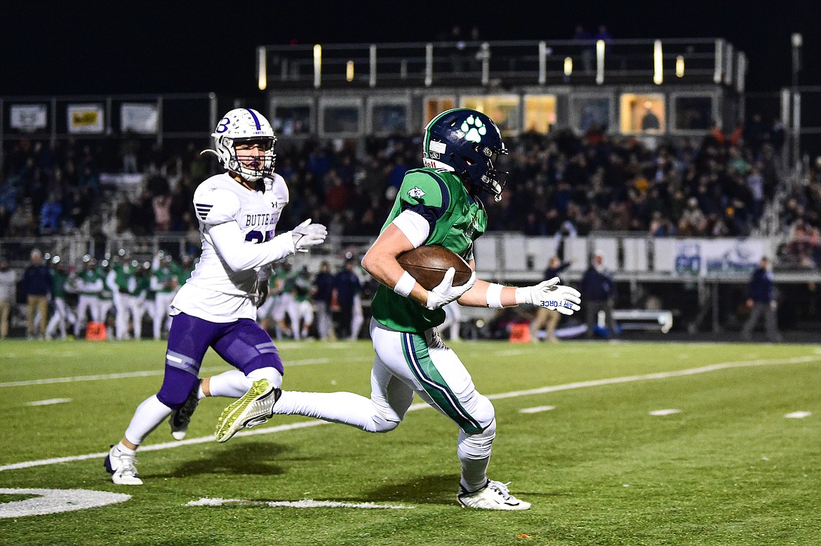 Glacier wide receiver Bridger Smith (1) runs during a 68-yard reception in the second quarter against Butte in a Class AA playoff game at Legends Stadium on Friday, Nov. 8. (Casey Kreider/Daily Inter Lake)