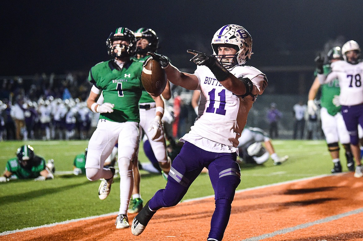 Butte running back Karson Pumnea (11) celebrates after a touchdown run in the second quarter against Glacier during a Class AA playoff game at Legends Stadium on Friday, Nov. 8. (Casey Kreider/Daily Inter Lake)