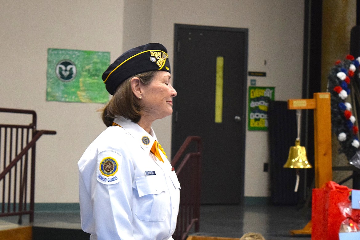 Kelly McHahan, a U.S. Navy veteran, smiles as she's applauded for her service during Saturday's Veteran's Recognition Ceremony in Rathdrum.