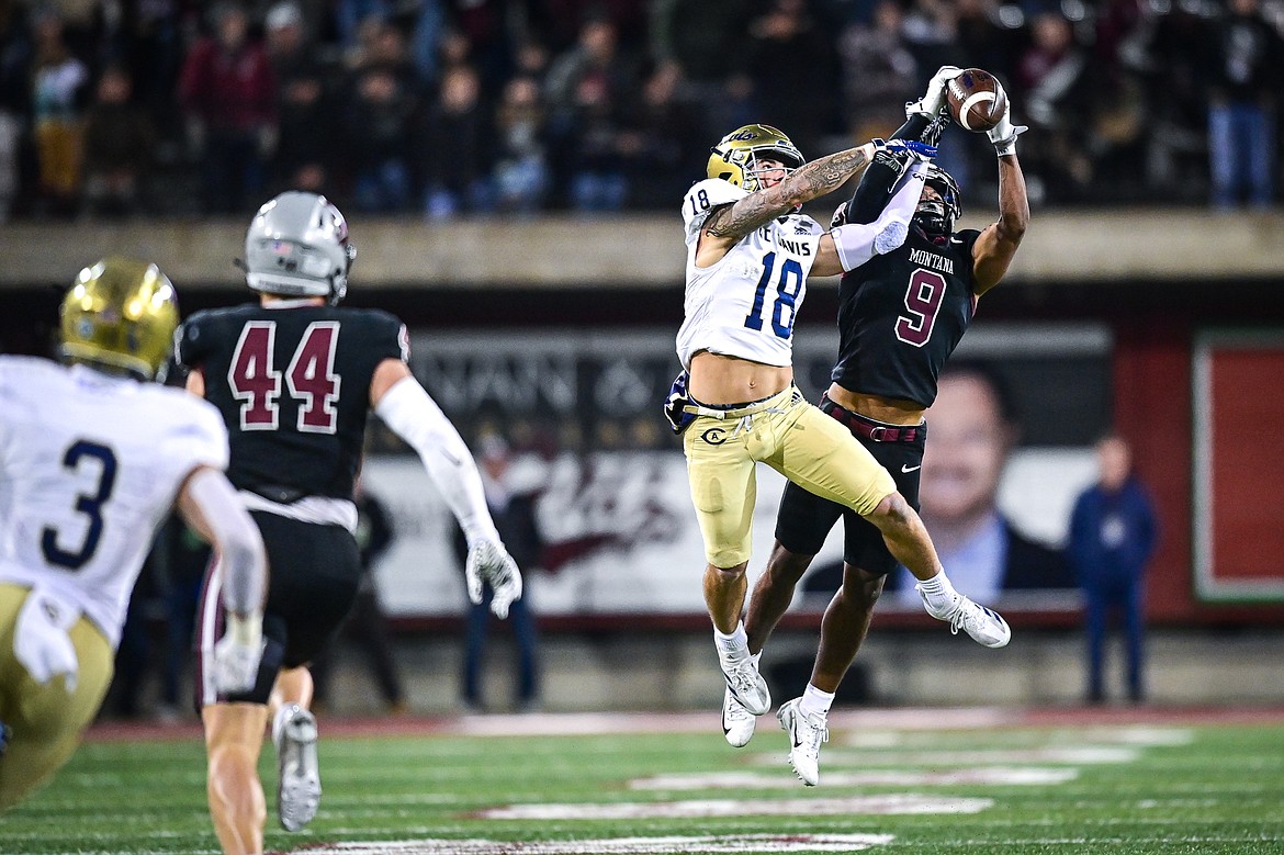 Grizzlies safety Crishawn Gordon (9) defends a pass attempt to UC Davis wide receiver Trent Tompkins (18) in the first quarter at Washington-Grizzly Stadium on Saturday, Nov. 9. (Casey Kreider/Daily Inter Lake)