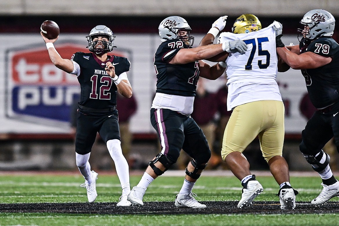 Grizzlies quarterback Logan Fife (12) throws a pass in the second quarter against UC Davis at Washington-Grizzly Stadium on Saturday, Nov. 9. (Casey Kreider/Daily Inter Lake)