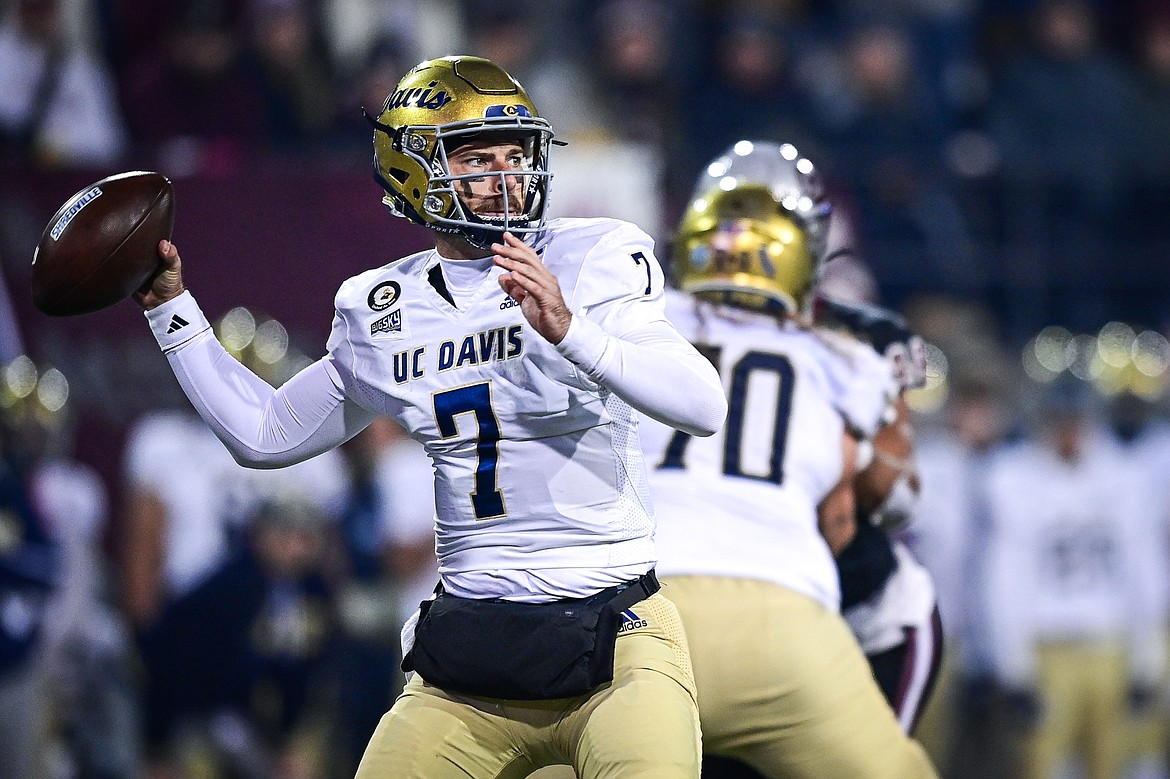 UC Davis quarterback Miles Hastings (7) drops back to pass in the third quarter against Montana at Washington-Grizzly Stadium on Saturday, Nov. 9. (Casey Kreider/Daily Inter Lake)