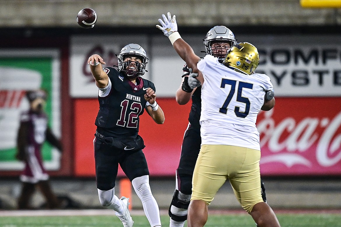 Grizzlies quarterback Logan Fife (12) throws a pass in the fourth quarter against UC Davis at Washington-Grizzly Stadium on Saturday, Nov. 9. (Casey Kreider/Daily Inter Lake)