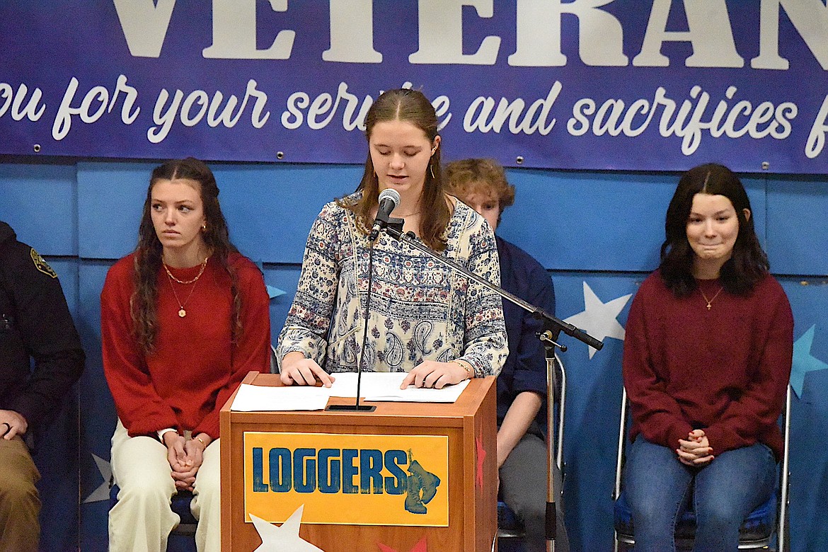 Libby High School's Leah Rusdal reads an essay Monday, Nov. 11, 2024, during a Veterans Day Assembly. (Scott Shindledecker/The Western News)