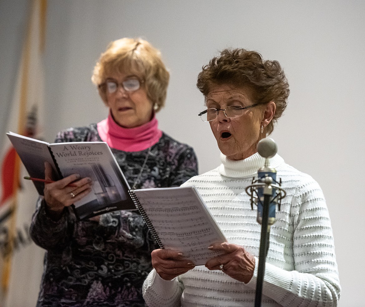 Soloists Nanci Bain and Holly Wilson practice for the Christmas Cantata at Bigfork Community United Methodist Church Monday night. (Avery Howe/Bigfork Eagle)