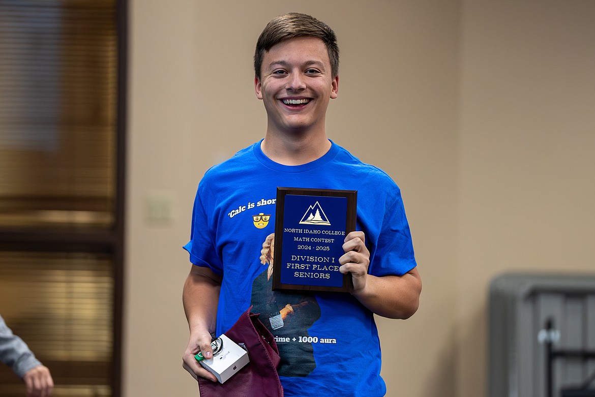 Division 1 senior winner Atlas Zastrow of Coeur d'Alene High School is all smiles Tuesday after excelling in the North Idaho College Math Contest.