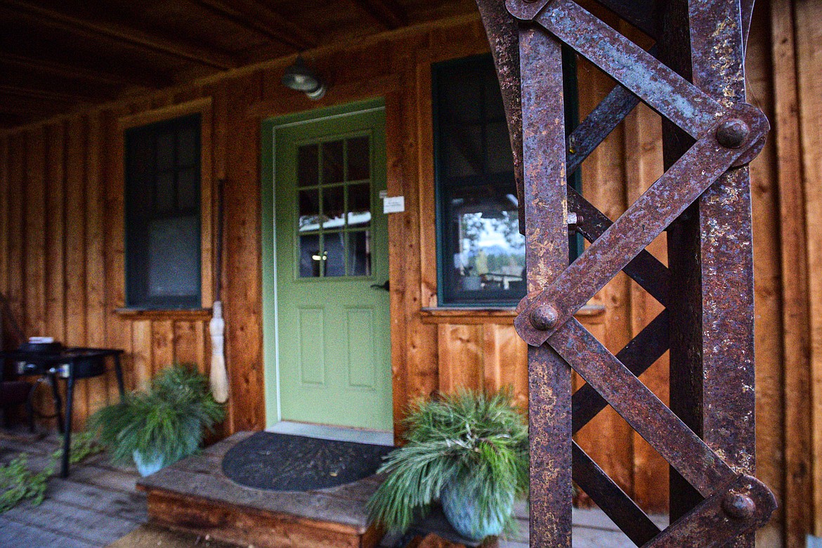 Support columns made from wrought iron from the Old Steel Bridge outside a residential building for instructors at Jeffrey Funk's New Agrarian School in Bigfork on Tuesday, Nov. 12. (Casey Kreider/Daily Inter Lake)