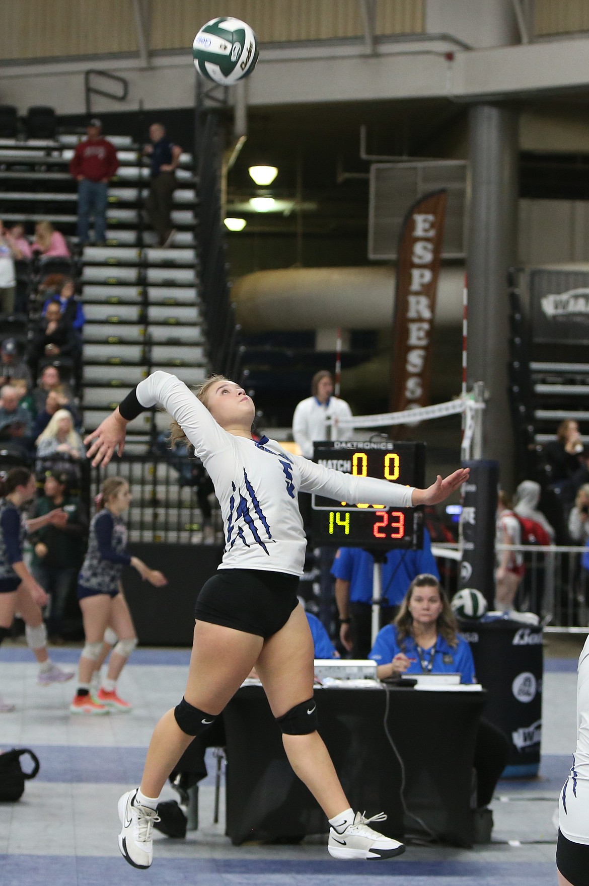 Soap Lake junior Liana Sushik jumps up to hit the ball over the net against Pe Ell Wednesday in the 1B State Volleyball Tournament.