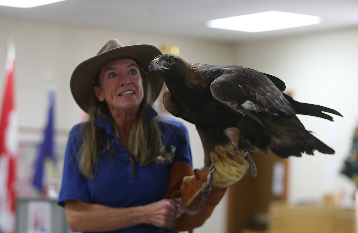 Janie Veltkamp and golden eagle Dakota make an appearance Friday at the Hayden Eagles during a Daughters of the American Revolution meeting.