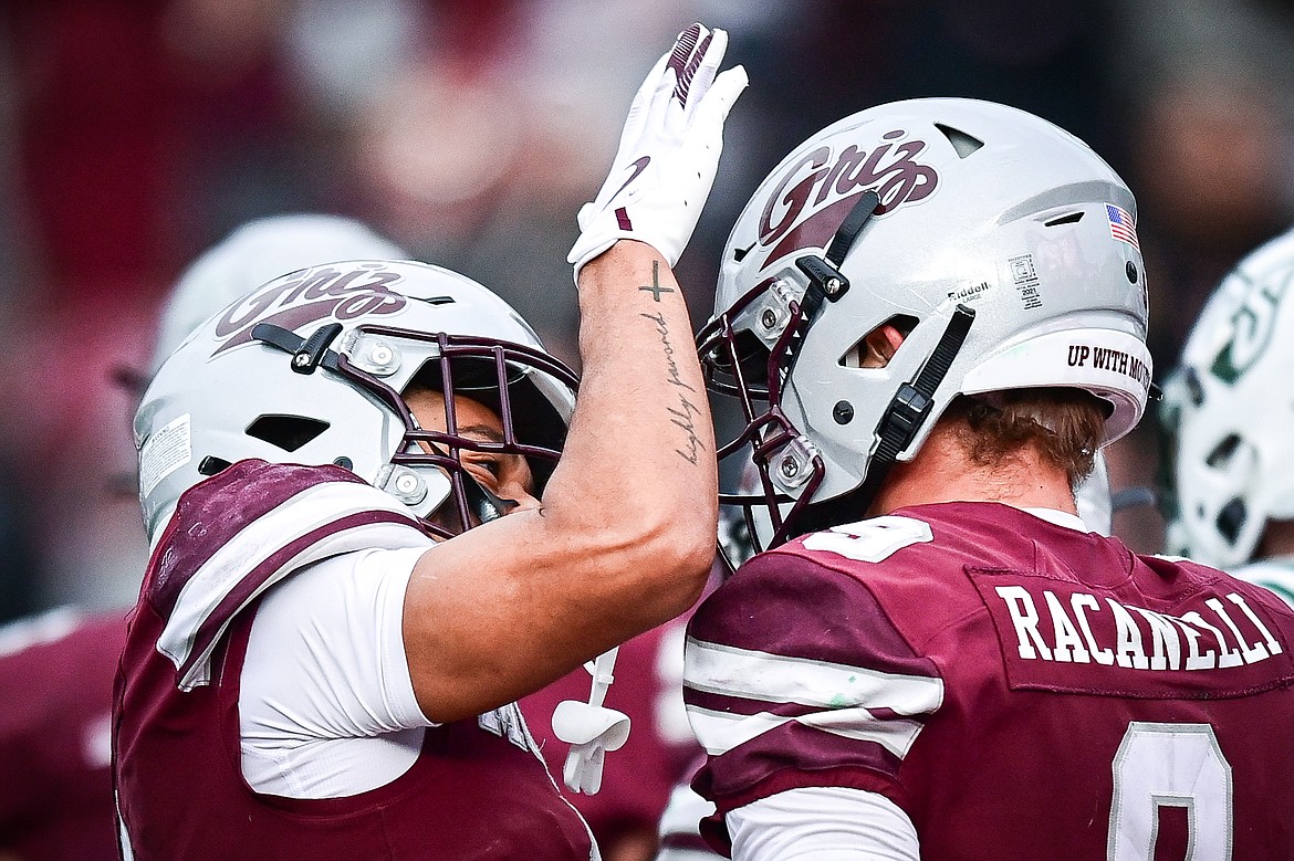 Grizzlies wide receivers Junior Bergen (5) and Sawyer Racanelli (9) celebrate after Racanelli's 81-yard touchdown reception in the third quarter against Portland State at Washington-Grizzly Stadium on Saturday, Nov. 16. (Casey Kreider/Daily Inter Lake)