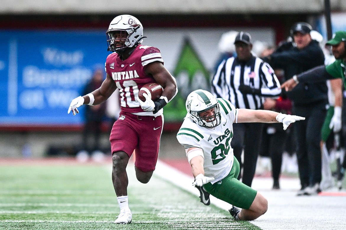 Grizzlies running back Eli Gillman (10) heads down the sideline on a 45-yard run in the fourth quarter against Portland State at Washington-Grizzly Stadium on Saturday, Nov. 16. (Casey Kreider/Daily Inter Lake)