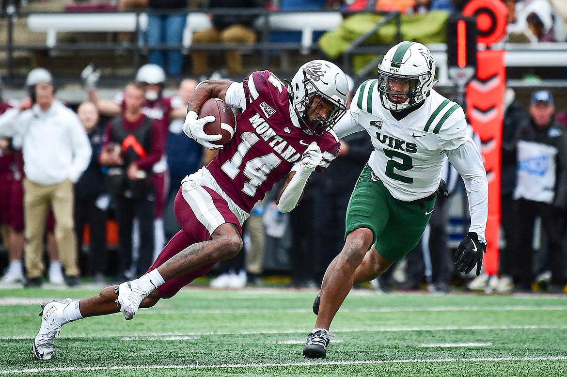 Grizzlies wide receiver Aaron Fontes (14) takes a 20-yard reception to the goal line in the third quarter against Portland State at Washington-Grizzly Stadium on Saturday, Nov. 16. (Casey Kreider/Daily Inter Lake)