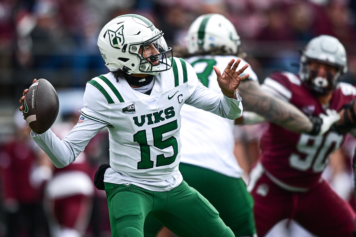 Portland State quarterback Dante Chachere (15) drops back to pass in the first quarter against Montana at Washington-Grizzly Stadium on Saturday, Nov. 16. (Casey Kreider/Daily Inter Lake)