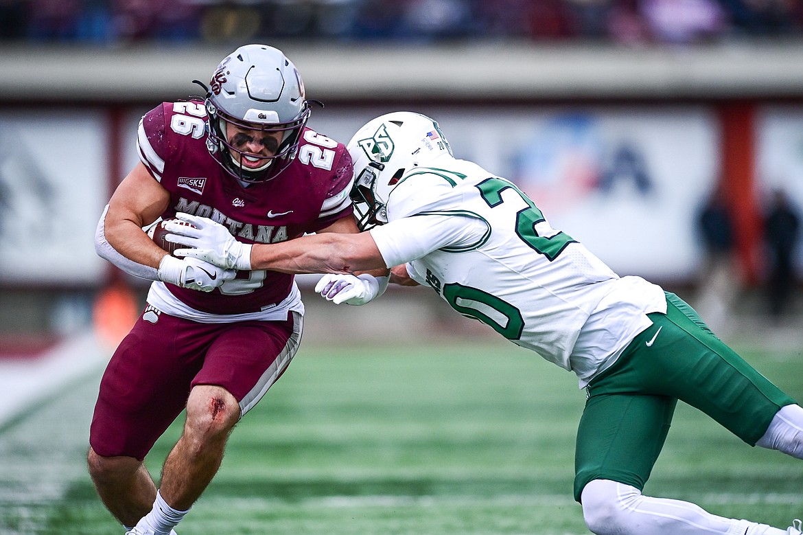 Grizzlies running back Nick Ostmo (26) picks up 11 yards on a reception in the third quarter against Portland State at Washington-Grizzly Stadium on Saturday, Nov. 16. (Casey Kreider/Daily Inter Lake)