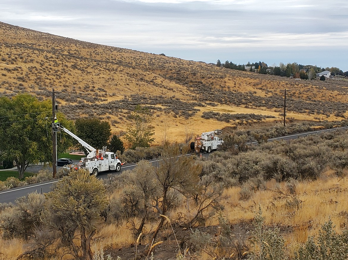 Crews from Blue Sky Communications work on the last stretch of fiber optic cable installation. When they’re done it will complete a Grant County PUD project that began in 2000.