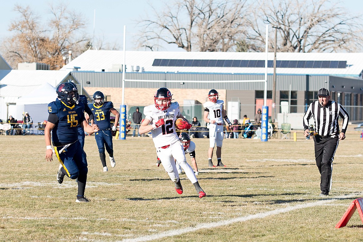 Hot Springs sophomore wide receiver Ben Aldridge runs with one of his nine receptions during the Savage Heat's state playoff semifinal versus Box Elder this past Saturday.  (Photo by Teresa Waterbury)