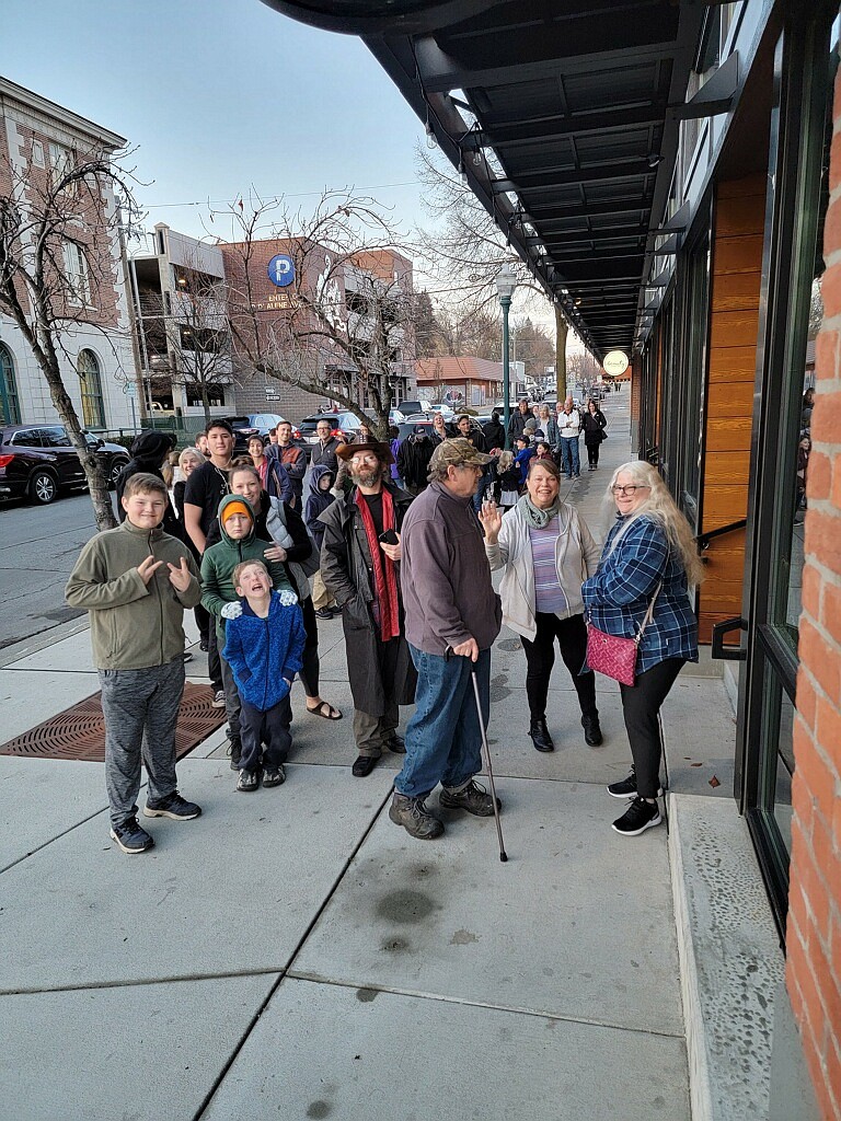 A line wraps around the block during Coeur d'Alene Burger Dock's 2023 Giving Thanks free community meal event. This year's free Thanksgiving meal will be from 4-6 p.m. Nov. 27 at the Coeur d'Alene and Sandpoint locations.