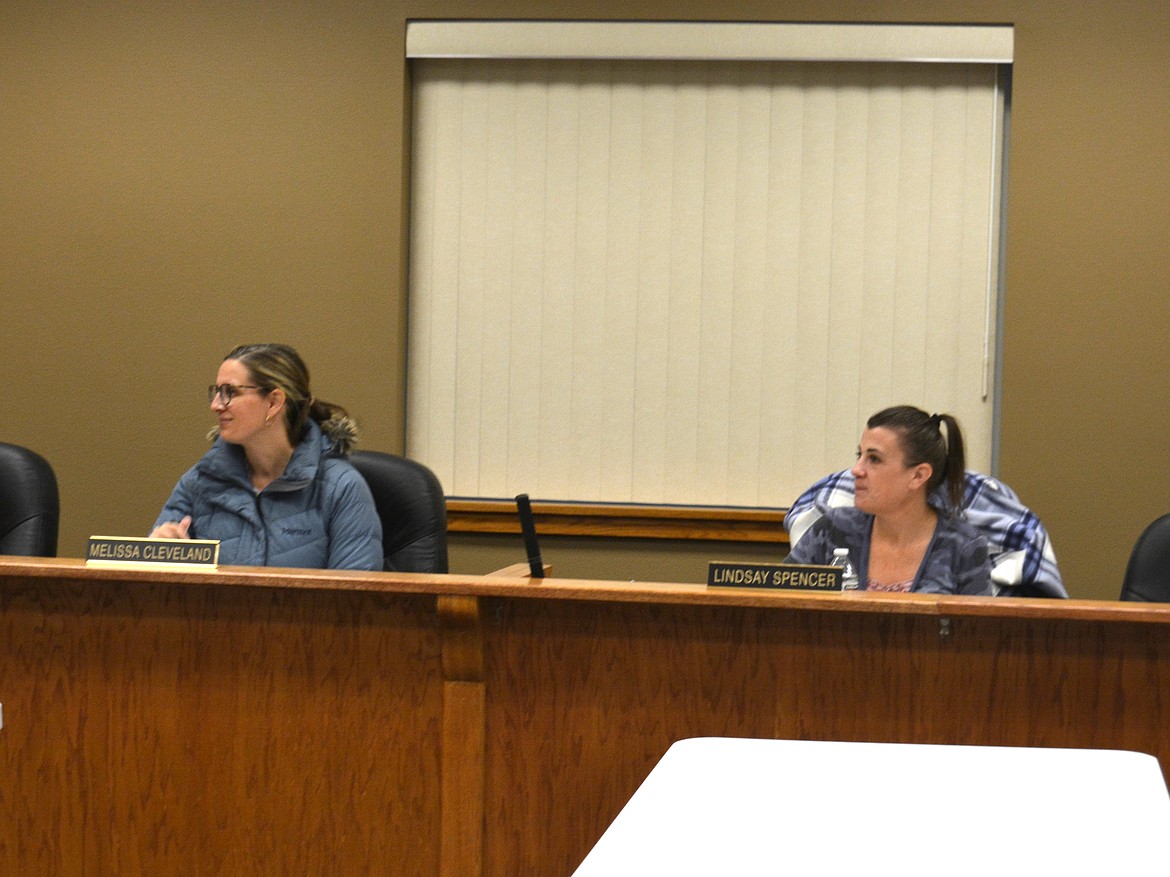 Hayden Urban Renewal Agency Executive director Melissa Cleveland and Lindsay Spencer discuss the future of the former Owl Café building Monday afternoon at Hayden City Council chambers.