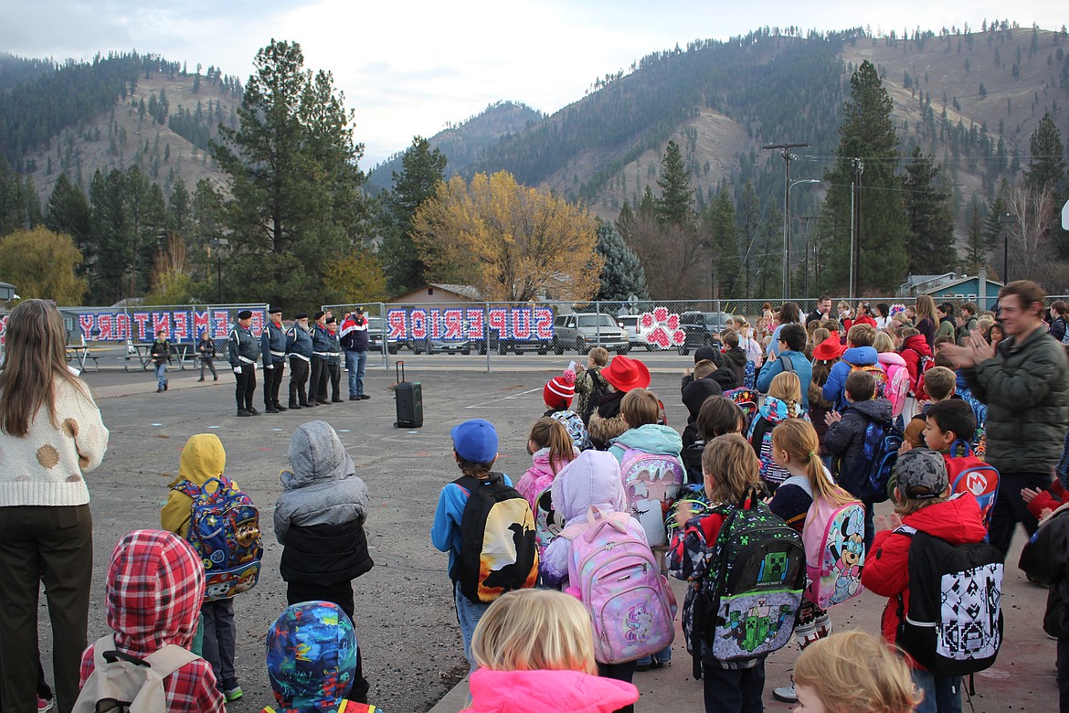 Students, teachers and administration from Superior Elementary School participate in a Veterans Day ceremony conducted by VFW Lloyd Ridings Post 6238 on Monday. The students gave the Honor Guard drawings they had made for the occasion as everyone had breakfast in the school cafeteria. (Monte Turner/Mineral Independent)