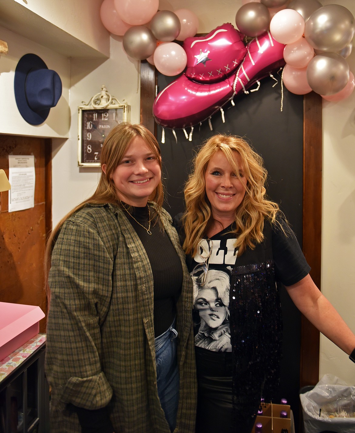 Gillian Broughton, employee, and Nikki Oaks, shop owner, are keeping the Trunk Show Consignment & Boutique busy during Ladies Night. (Kelsey Evans/Whitefish Pilot)