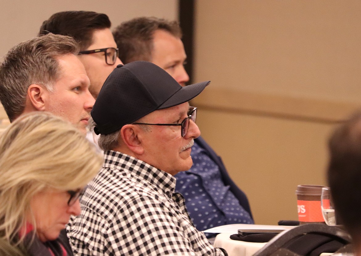 People listen during the Coeur d'Alene Regional Chamber's housing forum at the Best Western Plus Coeur d'Alene Inn on Tuesday.