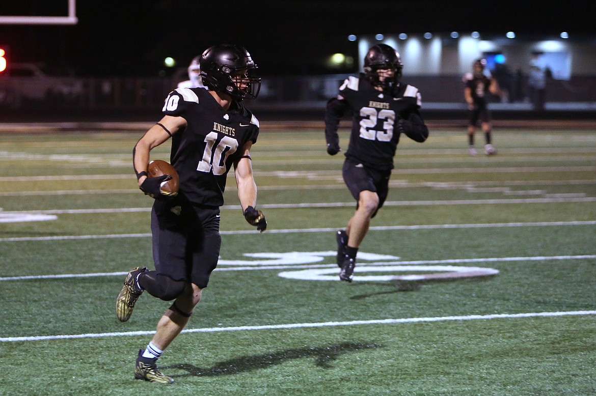 Royal senior Benson Jenks (10) returns a kickoff for a touchdown during a Nov. 8 game against Klahowya. The Knights have scored seven special teams touchdowns this season, including two on kickoff returns.