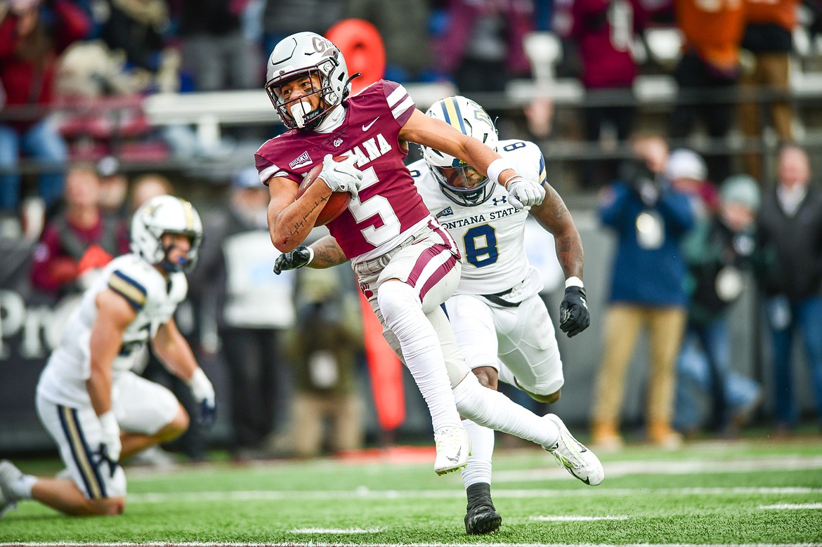 GRIZZLIES RECEIVER Junior Bergen (5) scores a touchdown on a 20-yard reception in the 122nd Brawl of the Wild at Washington-Grizzly Stadium on Nov. 18, 2023. (Casey Kreider/Daily Inter Lake)