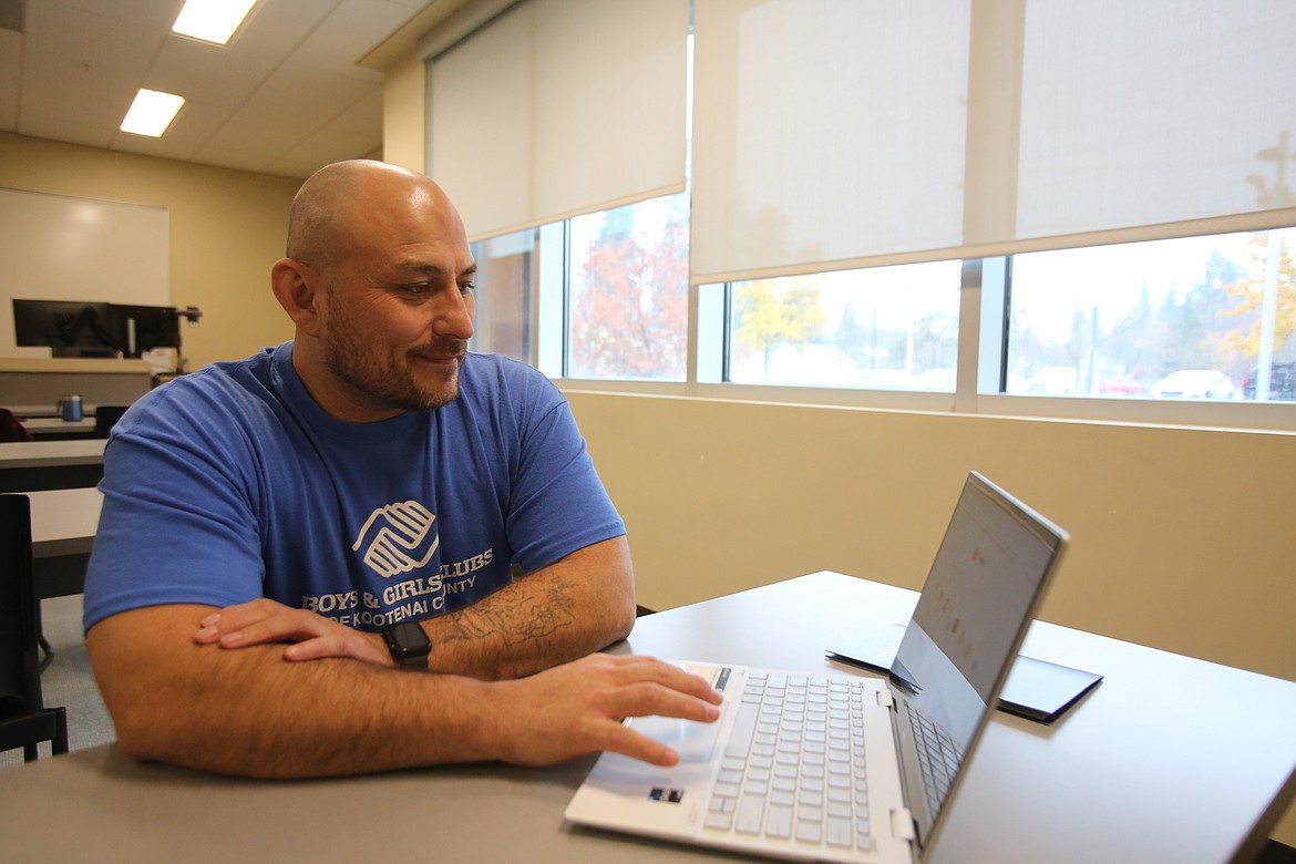 Paul Myers looks over his academic progress Thursday at North Idaho College.